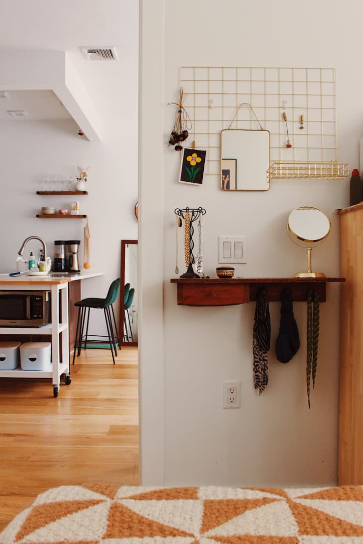Hanging art above light switch outlet